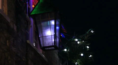 Christmas lights lantern blowing in the wind focus pull Stock Footage 33859606