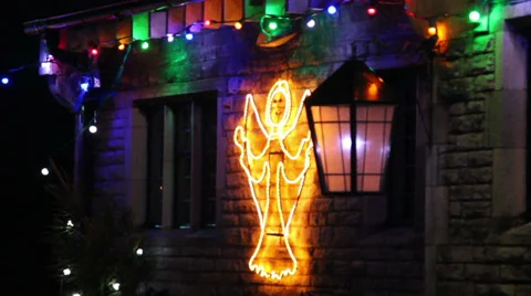 Christmas lights lantern blowing in the wind and angel Stock Footage 33861467