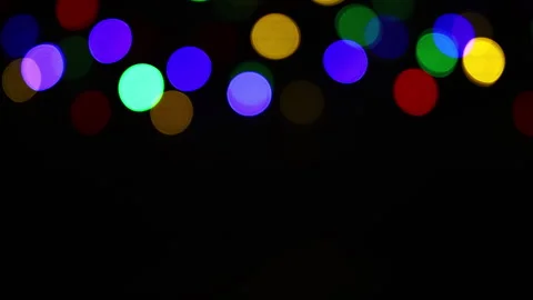 Christmas lights loop. Round colourful defocused lights. Stock Footage 284450883
