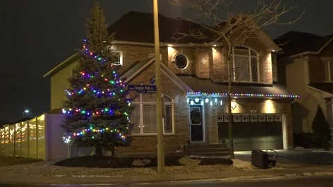 Christmas lights on regular homes in the suburbs Stock Footage 145142652