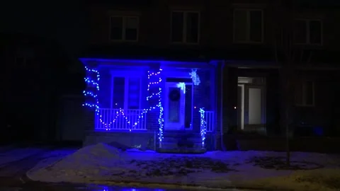 Christmas lights on regular homes in the suburbs Stock Footage 145142774