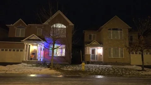 Christmas lights on regular homes in the suburbs Stock Footage 145142839
