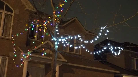 Christmas lights on regular homes in the suburbs Stock Footage 145142907