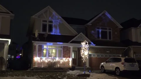 Christmas lights on regular homes in the suburbs Stock Footage 145143033