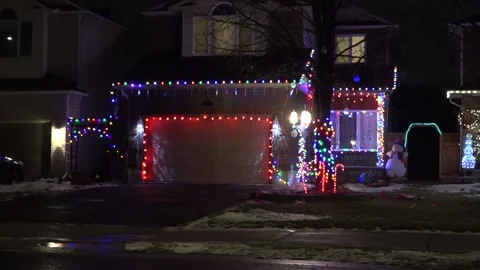 Christmas lights on regular homes in the suburbs Stock Footage 145143062