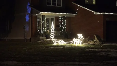 Christmas lights on regular homes in the suburbs Stock Footage 145143065
