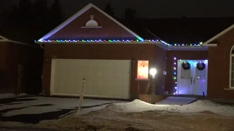 Christmas lights on regular homes in the suburbs Stock Footage 145143162