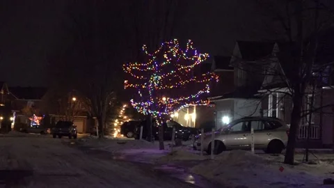 Christmas lights on regular homes in the suburbs Stock Footage 145143400