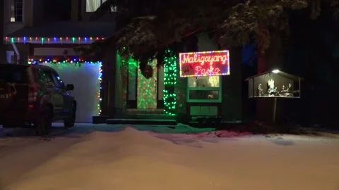 Christmas lights on regular homes in the suburbs Stock Footage 145143981