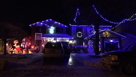 Christmas lights on regular homes in the suburbs Stock Footage 145144368