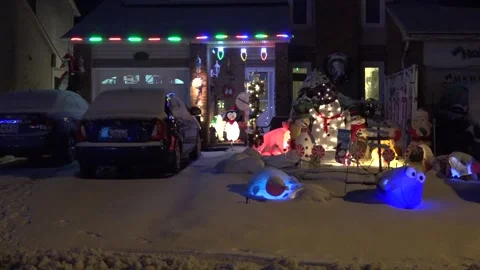 Christmas lights on regular homes in the suburbs Stock Footage 145144599