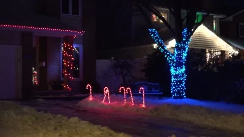 Christmas lights on regular homes in the suburbs Stock Footage 145144610