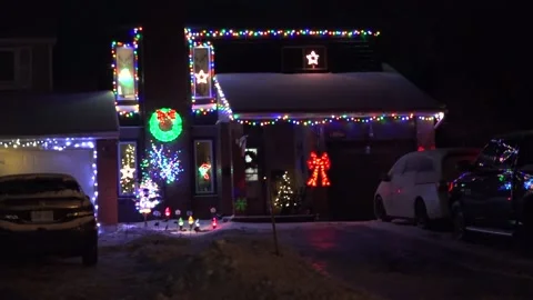 Christmas lights on regular homes in the suburbs Stock Footage 145144669