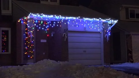 Christmas lights on regular homes in the suburbs Stock Footage 145144697