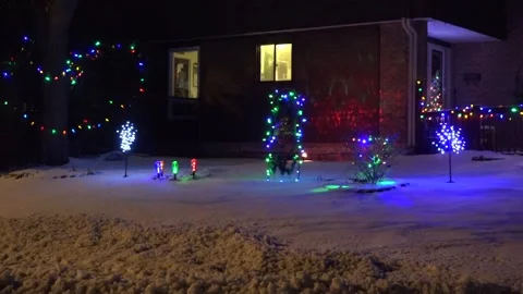 Christmas lights on regular homes in the suburbs Stock Footage 145144893