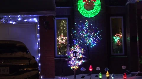 Christmas lights on regular homes in the suburbs Stock Footage 145144895