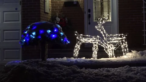 Christmas lights on regular homes in the suburbs Stock Footage 145145144