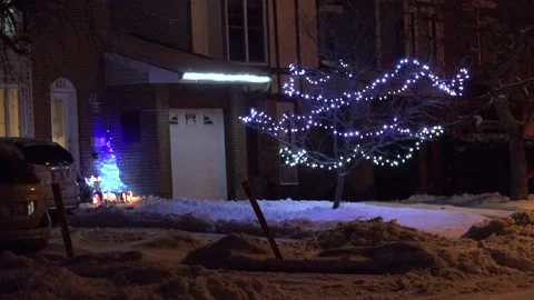 Christmas lights on regular homes in the suburbs Stock Footage 145145169