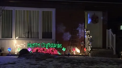Christmas lights on regular homes in the suburbs Stock Footage 145196244