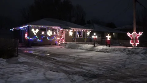 Christmas lights on regular homes in the suburbs Stock Footage 145197545
