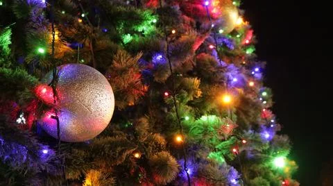 Christmas lights on tree background Stock Photos