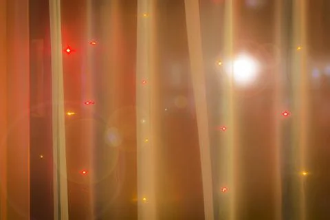 Christmas lights in the window. Stock Photos