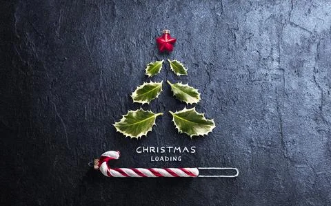 Christmas Loading Minimal Concept - Tree And Candy Canes On Dark Background Stock Photos
