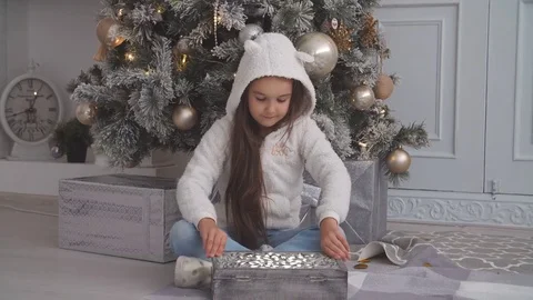 Christmas magic gift box and happy Child baby. Stock Footage 81445411