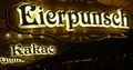 Christmas market drink booth illuminated sign night shot 4k or 4k+ Resolution