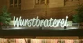 Christmas market sausage salami food both illuminated sign 4k or 4k+ Resolution