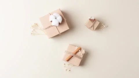 Christmas minimal composition with packaging gifts in craft paper Stock-Footage 306482393