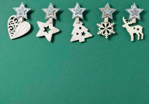 Christmas minimal flat lay composition. Border made of wooden Xmas decorations Stock Photos