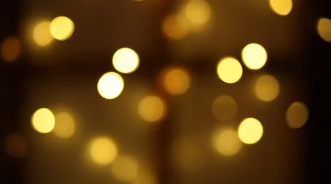 Christmas miracle waiting by the window. Flickering colored lights in the window Stock Footage 68800486