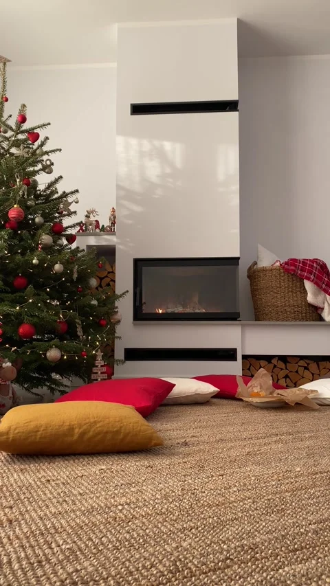 Christmas modern home interior during daytime with fireplace Stock Footage 277686140