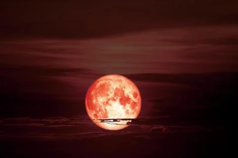 Christmas moon back over cloud red night sky 库存照片