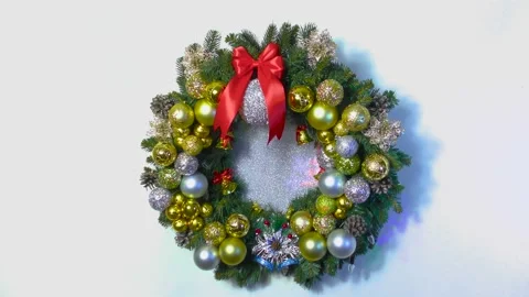 Christmas in motion big on a white background Christmas wreath Video stock 166344357