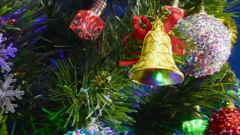 Christmas in motion close-up with promoting decorations on the tree Stock Footage 166706083