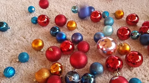 Christmas multicolored balls falling in slow motion. Stock Footage 220784490