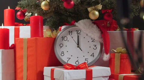 Christmas New Year countdown clock is ticking under Christmas tree Stock Footage 55746597