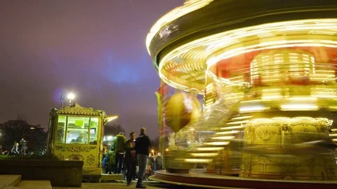 Christmas night paris crowded carousel panorama 4k time lapse france Stock Footage 74716555
