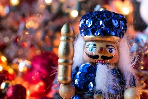 Christmas nutcracker decorations with festive lights scene Stock Photos