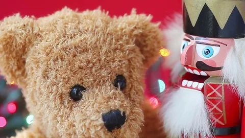 Christmas nutcracker talks to teddy bear Stock Footage 83490773