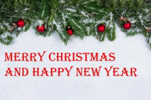 Christmas objects covered with fresh snow with holiday text Stock Photos