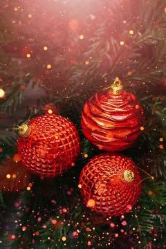 Christmas or New Year card with red baubles on Christmas Tree branches on woo Stock Photos