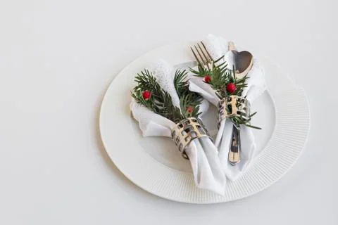 Christmas or New Year Menu Service with stylish,white fabric napkins Stock Photos