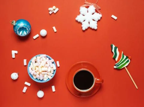 Christmas or winter composition. Cup with coffee, marshmallows and Christmas Stock Photos