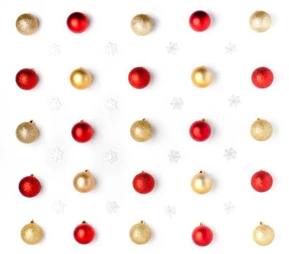 Christmas or winter composition. Pattern made of red, golden balls and white Stock Photos