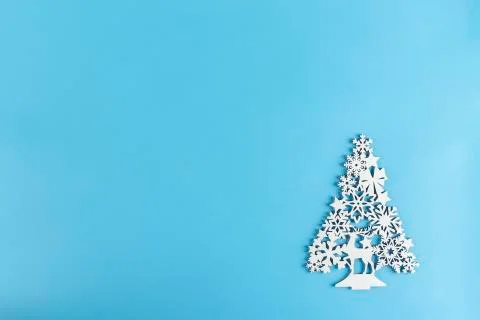 Christmas or winter composition. Pattern made of white elements on pastel blu Stock Photos