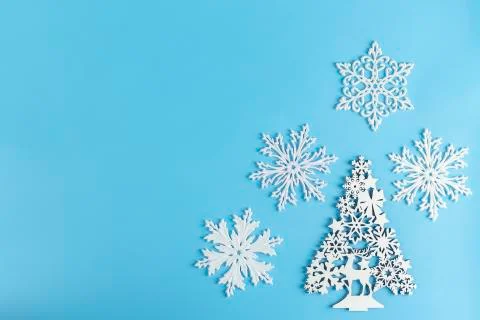 Christmas or winter composition. Pattern made of white elements on pastel blu Stock Photos