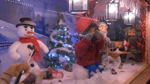 Christmas ornaments and toys in a shop window Stock Footage